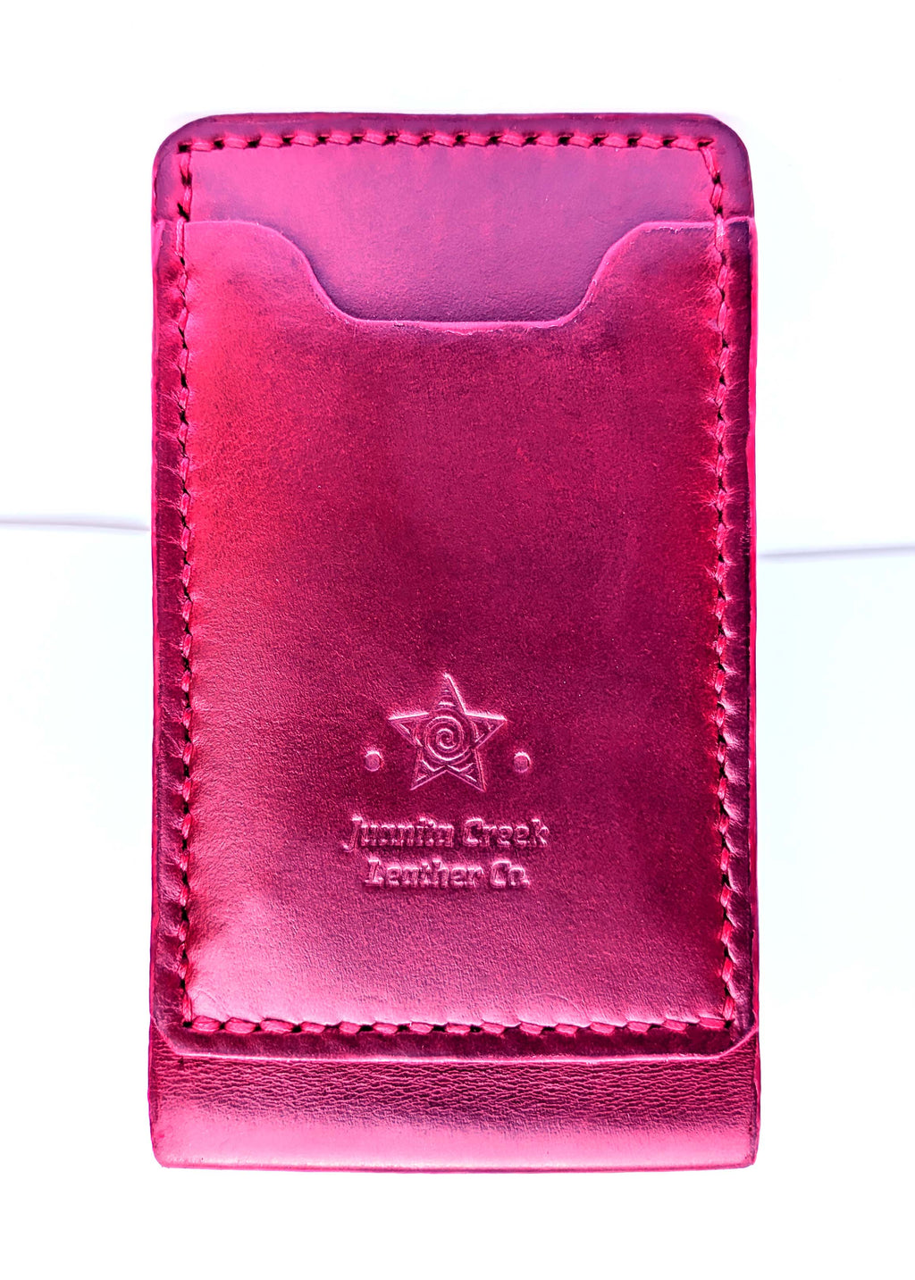 A deep red leather bifold money clip wallet with decorative red contrast stitching, shown against a plain white background.